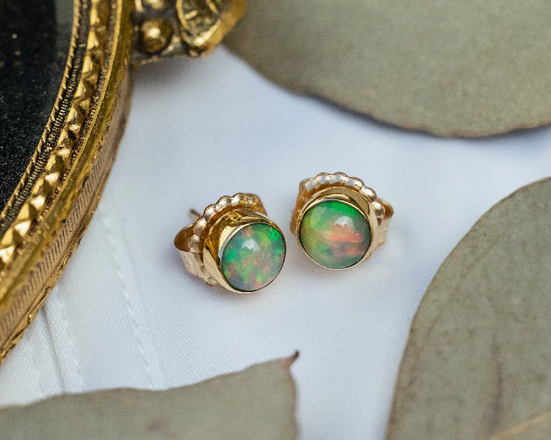 Broad hoop earrings-STUD BEZEL SET ETHIOPIAN OPAL EARRINGS IN 14K YELLOW GOLD