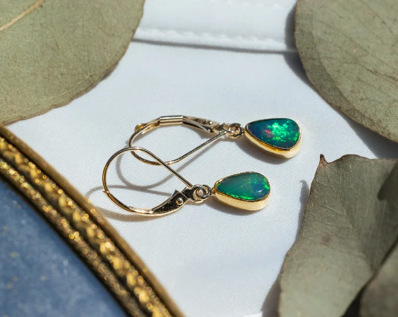 Lily motif earrings-TEARDROP BEZEL SET ETHIOPIAN OPAL EARRINGS IN 14K YELLOW GOLD