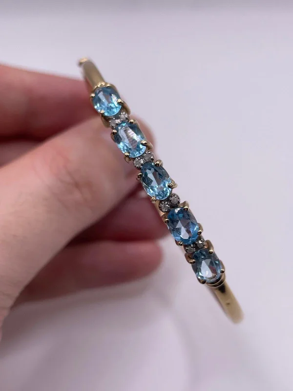 Gem stack bracelets-9ct gold blue topaz and diamond bangle