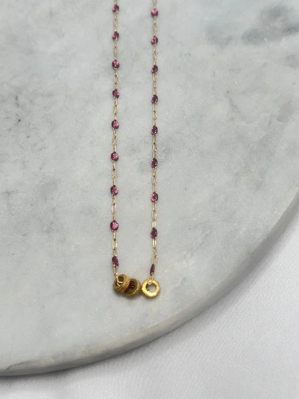 Blended metal rings-Necklace - Three Gold Rings On Pink Crystals