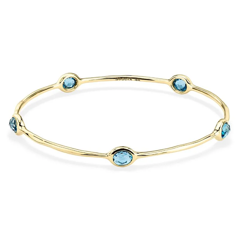 Twist charm bangles-IPPOLITA Lollipop® 18K Yellow Gold Five Stone Bangle in London Blue Topaz