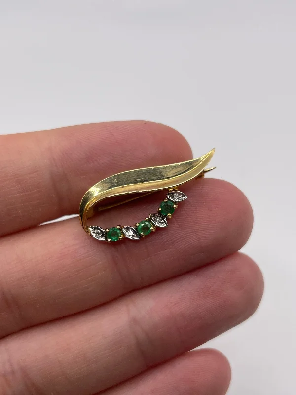 Abstract shape brooches-9ct gold emerald and diamond brooch